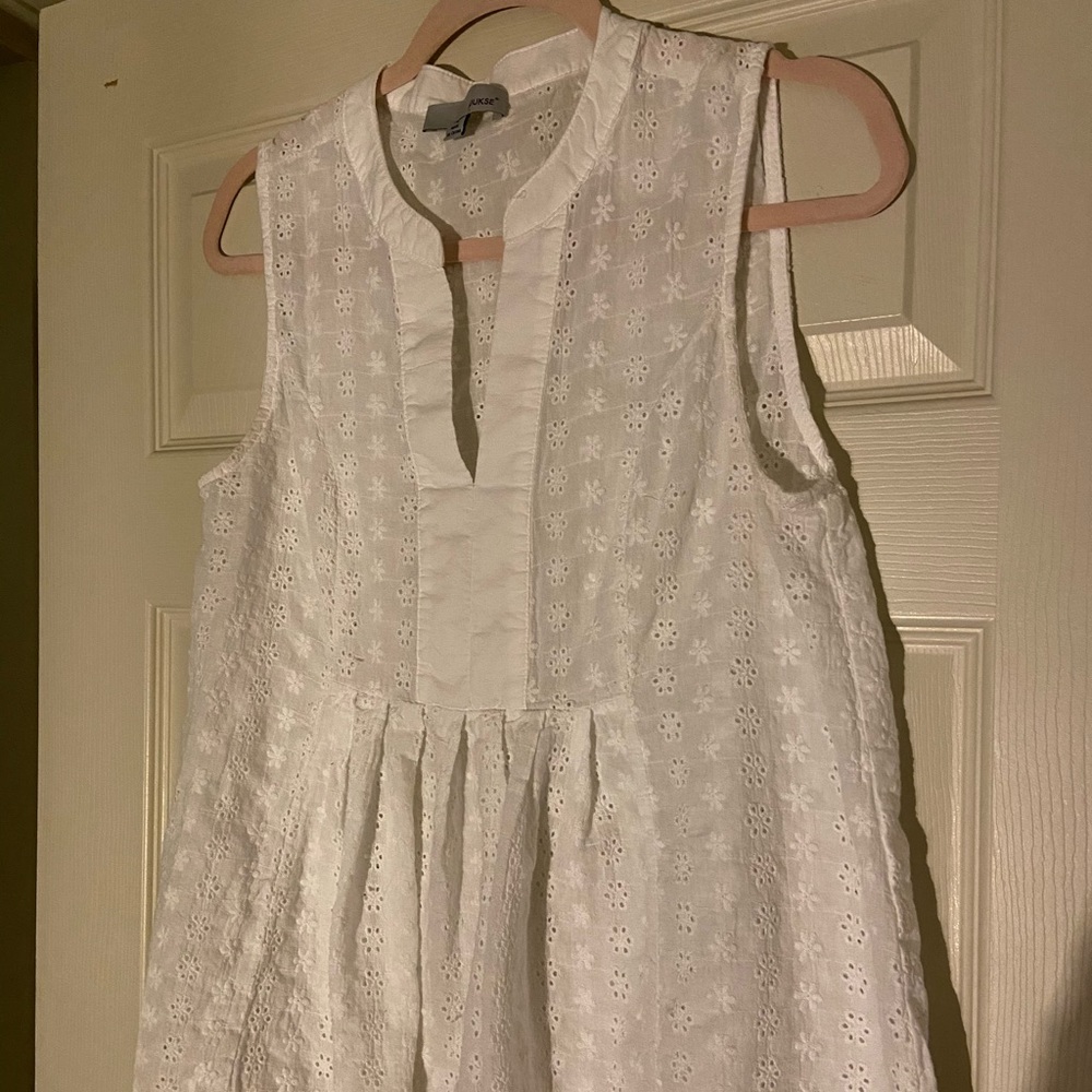 White Sleeveless Shirt